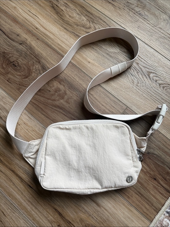 lululemon athletica Handbags - Lululemon Cream Crossbody Belt Bag 2L